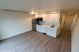 louisa-hotel-seattle-wa-building-photo grey floor kitchen wide